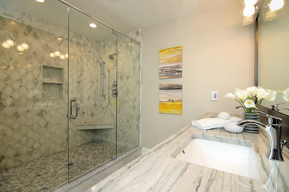 custom bathroom with walk in shower and white counters by Chris Gorman Homes in Cincinnati, Ohio