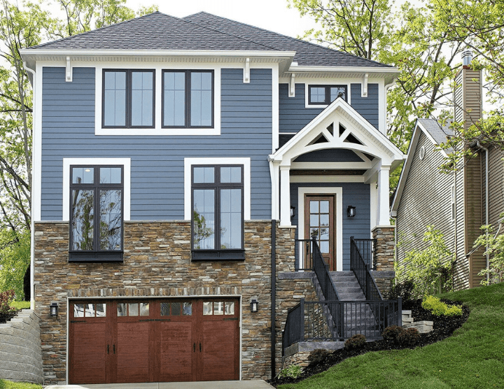 exterior of blue and brick custom home in Cincinnati, Ohio by Chris Gorman Homes
