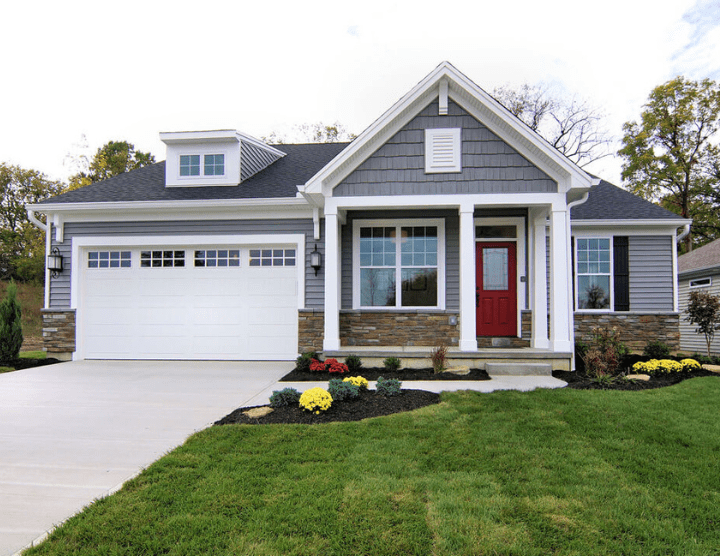 exterior of home with garage and white columns by Chris Gorman Homes in Cincinnati, Ohio